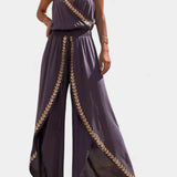 Lorena | Kombinezon s zlatnim detaljima i šlicem na nozi