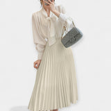 Duga plisirana suknja od saten-stila