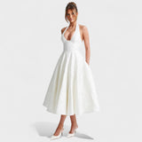 Effie - Midi haljina s teksturiranim materijalom i V izrezom