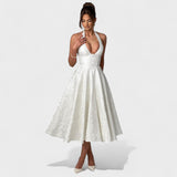 Effie - Midi haljina s teksturiranim materijalom i V izrezom